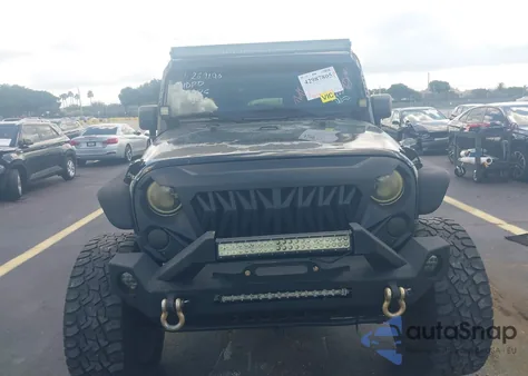 2012 Jeep Wrangler Unlimited Sport from USA, damaged, VIN 1C4BJWDGXCL269190